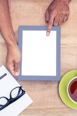 Poster - Cropped image of hand using on digital tablet