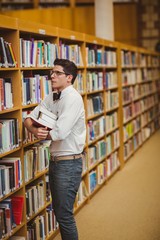 Poster - Portrait of nerd holding books
