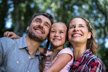 Wall Mural - Happy parents with daughter in back yard