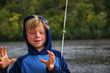 © RooM The Agency - Boy fishing showing size of catch