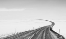 Empty Road Through Winter Landscape, Iceland