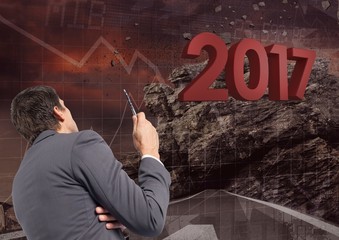 Poster - Composite image of 2017 with business man planning about growth