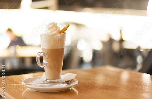 Fotografie, Obraz Cup of coffee latte with whipped cream and gingerbread
