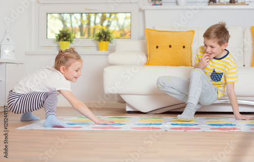 Fotografie, Obraz Two happy children playing exciting game at home