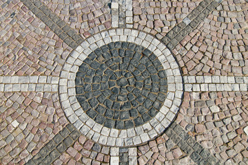 Granite cobblestoned pavement background with rounded design