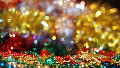 Shiny Christmas background with colored garlands and bright