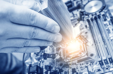 Poster - Hand installing the computer chip 