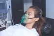 © Coka - young woman with oxygen mask