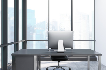 Poster - Close up of a desktop in panoramic window room