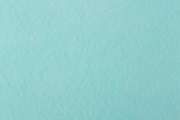 Sticker - Texture of light blue felt.