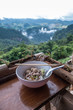 Thai noodle bowl on the wooden table with beautiful view