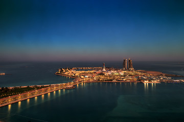 Abu Dhabi Marina Mall as seen from a distant skyscraper at sunrise in Abu Dhabi, UAE