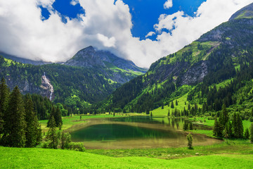 Wall Mural - Pathway leading to Lauenensee near Gstaad in Swiss Alps, Berner Oberland, Switzerland