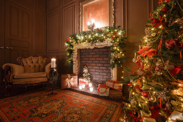 Wall Mural - Calm image of interior Classic New Year Tree decorated in a room with fireplace