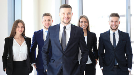 Portrait of happy business partners looking at camera