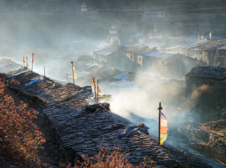 Fototapete - Sunrise view of traditional Nepali village in high hymalaya mountains. Manaslu circuit