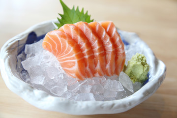 salmon sashimi on wood background , Japanese food