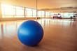 exercise ball for fitness on wooden floor