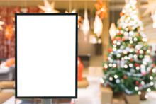 Blank Sign With Copy Space For Your Text Message Or Mock Up Content In Modern Shopping Mall With Christmas Tree.