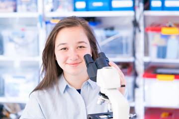 Canvas Print - Student girl in microbiological class. Researsh in science laboratory