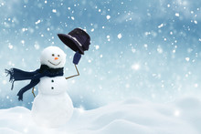 Happy Snowman Standing In Christmas Landscape