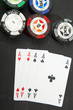 Combination of cards, playing poker on a black wooden table