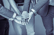 © whyframeshot - Team work business ideas concept. Business people with suit join