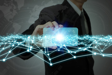Aufkleber - business person holding smart phone and mesh communication network concept