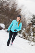 © Voyagerix - Winter sport, girl exercising in park