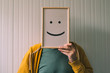 Put a happy optimistic face on, happiness and cheerful emotions