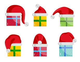 Wall Mural - Christmas gifts icons. Colorful wrapped presents in Christmas hats vector illustration isolated on white background set. Merry Christmas and Happy New Year concept.