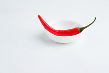 Red Chili Peppers In A White Plate Closeup