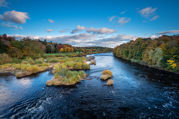 River Tyne below Corbridge, winding its way down the Tyne Valley, in Northumberland, on a sunny day