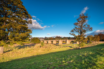 Wall Mural - corbridge road bridge in autumn, originally built in the thirteenth century, the bridge at corbridge