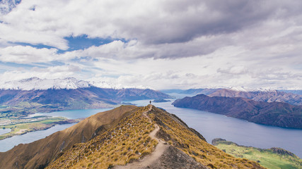 Wall Mural - Man stand on Roy's Peak in New Zealand