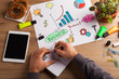 © Milos Tasic - Top view of man hand writing in notebook. financial worker analy
