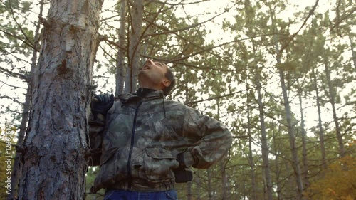 Stock Video of a man lost in the woods, stopped to rest at Adobe Stock ...