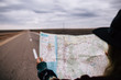 © ADDICTIVE STOCK - A woman looking at map