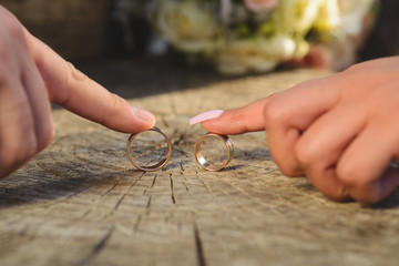 Canvas Print - Newlyweds Having Fun with Rings