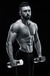 © nazarovsergey - Muscular bodybuilder guy doing posing