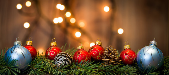 Christmas background with decorations on wooden board