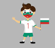 Fan of Bulgaria national football team, sports. Boy with flag in the colors of the national command with sports paraphernalia.