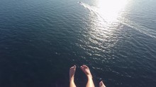 POV Of Parasailing / Flying Barefoot Over The Ocean Behind A Boat. Location: Budva Riviera, Montenegro.