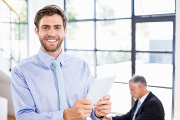 Poster - Businessman using digital tablet
