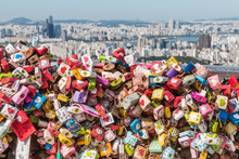Colourful Love Locks At Seoul Tower With Seoul Skyline In Background
