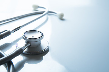 stethoscope on blue background