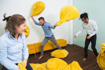 Wall Mural - Crazy beanbag fight at meeting with friends