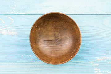 Wall Mural - Empty bowl in the wood