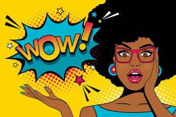 Wow pop art  face. Sexy surprised young african woman with open mouth and afro hairstyle in glasses and Wow speech bubble. Vector colorful background in pop art retro comic style.