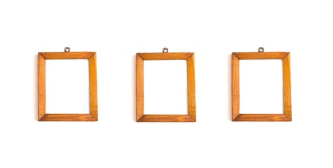 Wooden frame on white wall.